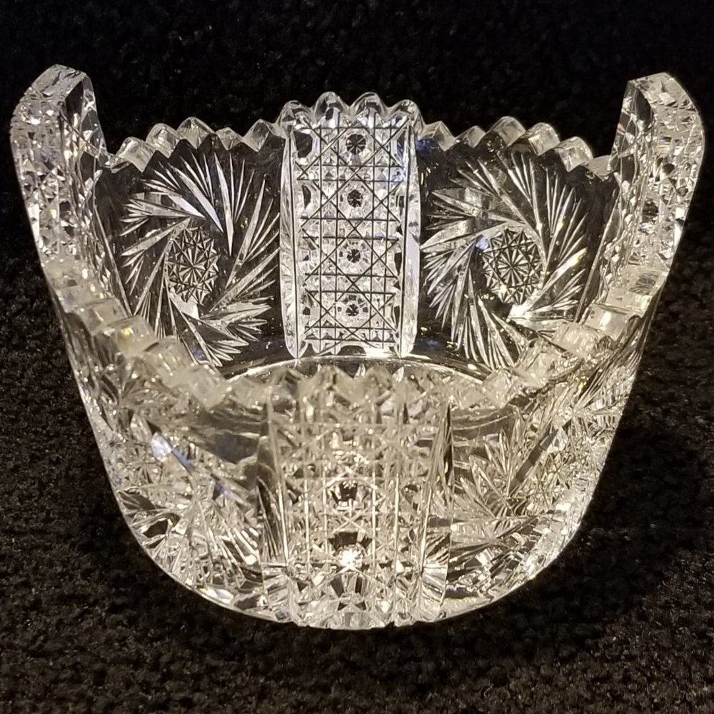 Crystal Dish very good condition. Heavy, clear, cut pinwheels & geometric shapes